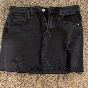 washed ripped black denim skirt